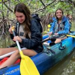 girls having fun on a cocoa beach kayaking trip