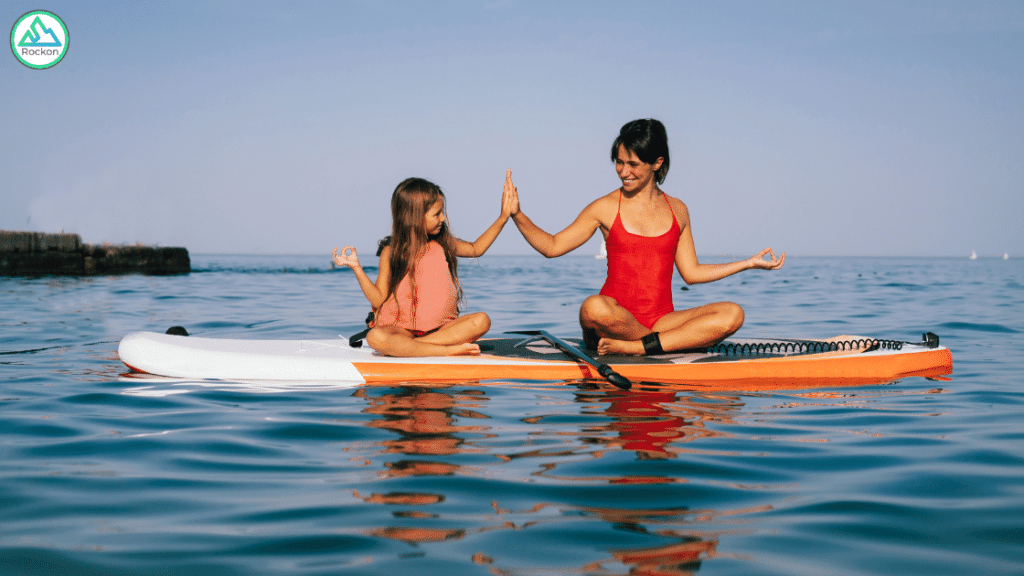 yoga paddleboard SUP with kid