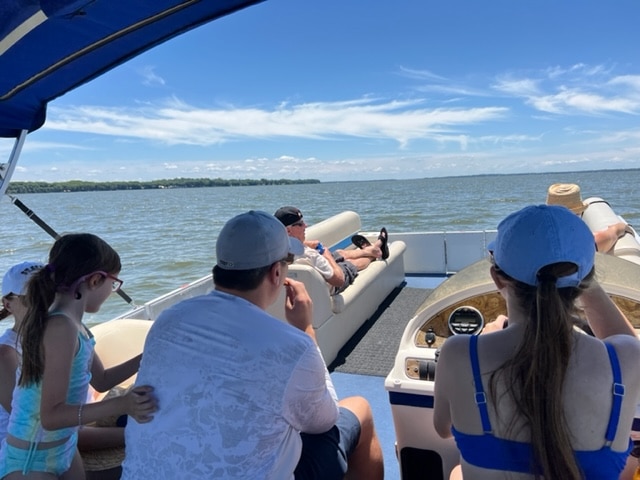 family renting a pontoon boat rental